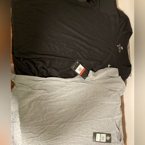 Grey Under Armour & Black Nike Women’s Large Athletic Tees. Both Tees Included